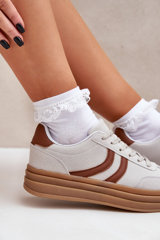 Grijze stijlvolle dames sneakers met... Grijze stijlvolle dames sneakers met...