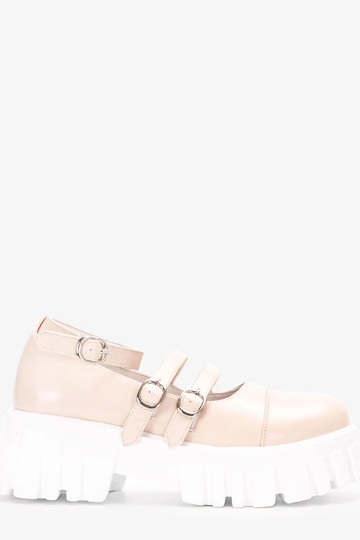 Beige halfhoge schoenen op...