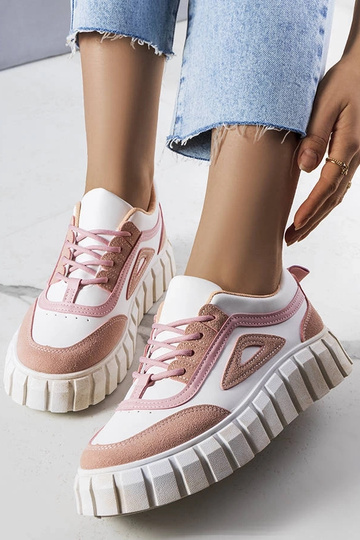 Roze schoenen op een...