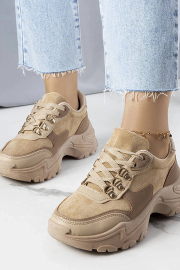Beige sneakers i en...