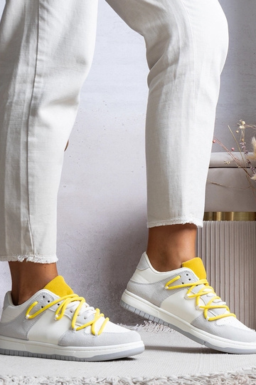 Grå damesneakers med gule...