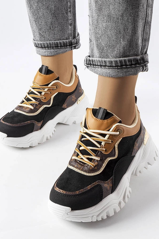 Sorte sneakers med en uregelmæssig... Sorte sneakers med en uregelmæssig...