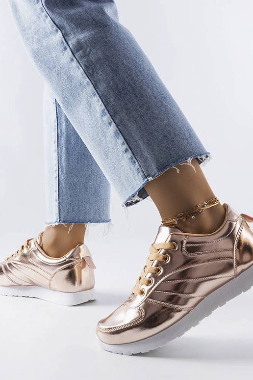 Quessy guld sneakers