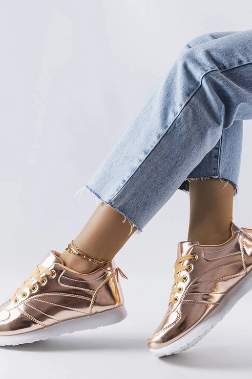 Quessy guld sneakers