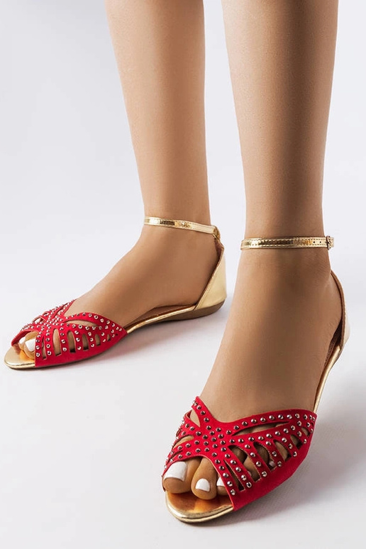 Røde gennembrudte sandaler med... Røde gennembrudte sandaler med...