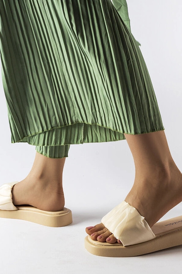 Beige rutsjebaner dekoreret... 2