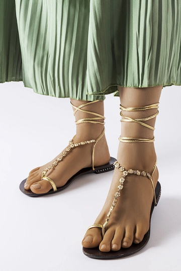 Troghi guld sandaler med...