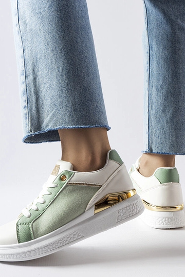 Hvide og grønne sko med... 2