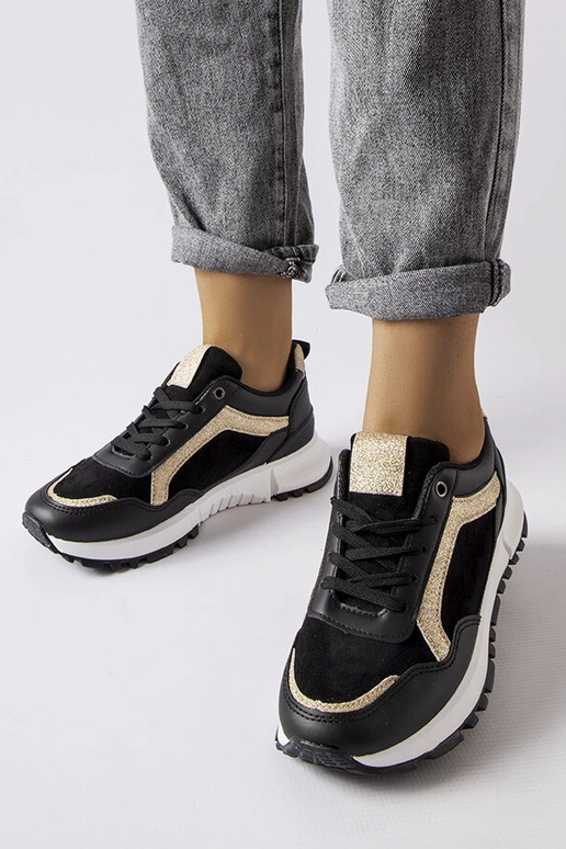 Sorte sneakers med glitterdekoration...