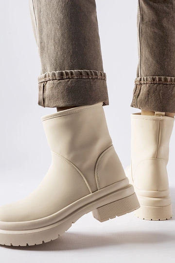 Beige gummiisolerede...