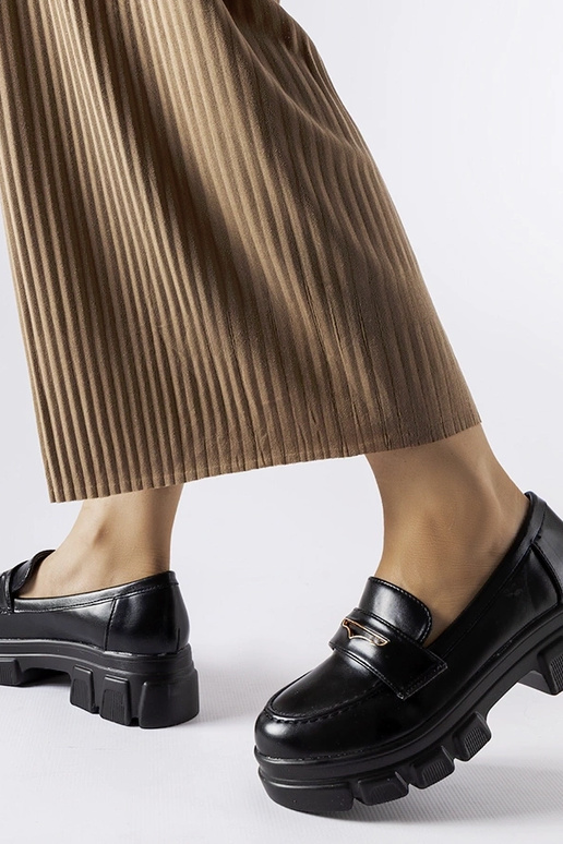 Sorte mokkasiner med synlig slidbane... Sorte mokkasiner med synlig slidbane...