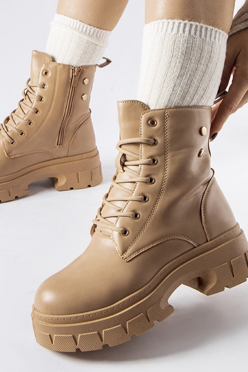 Beige arbejdere med en...