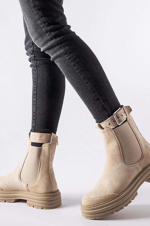 Beige ankelstøvler med dekorativt lås...