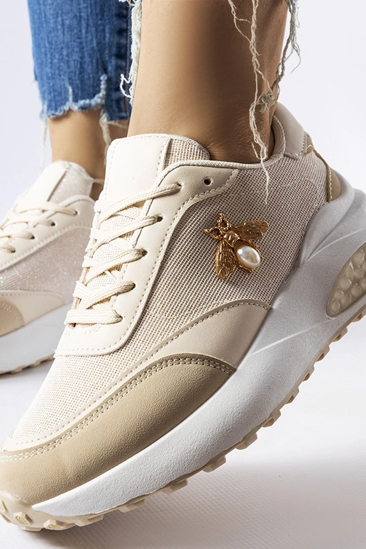 Beige og hvide sneakers med dekorativ...