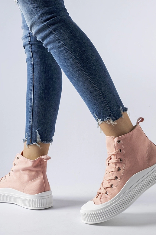 Roze hoge schoenen op een platform,...