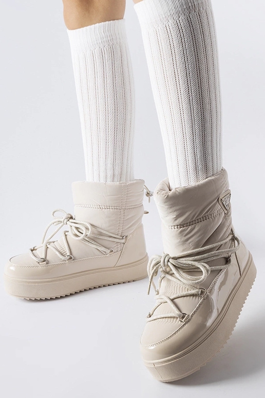 Beige isolerede snestøvler med... Beige isolerede snestøvler med...