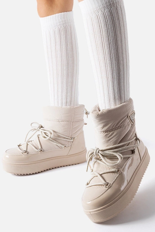 Beige isolerede snestøvler med... Beige isolerede snestøvler med...