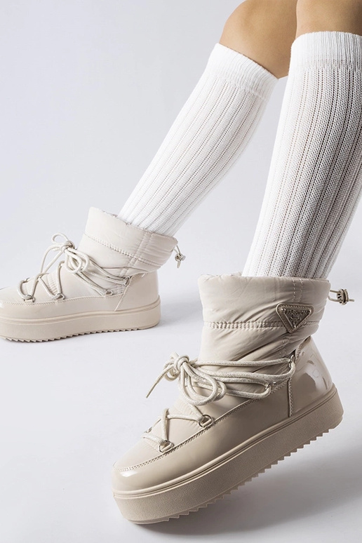 Beige isolerede snestøvler med... Beige isolerede snestøvler med...