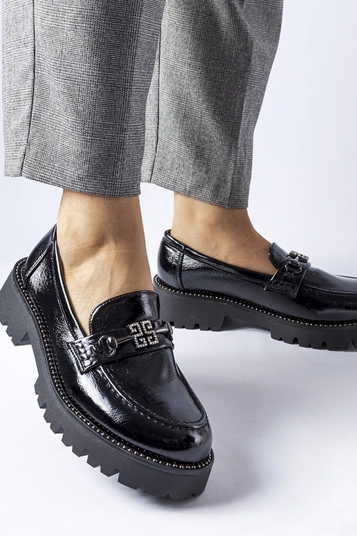 Zwarte lakleren instappers met... Zwarte lakleren instappers met...