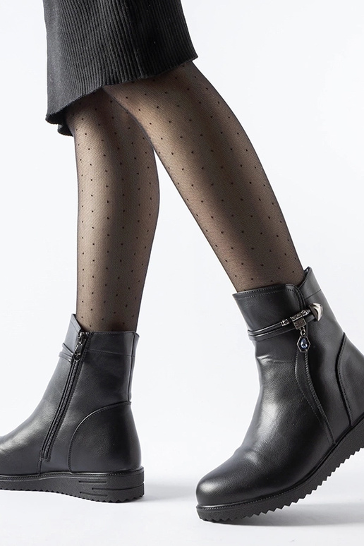 Zwarte gevoerde laarzen met... Zwarte gevoerde laarzen met...