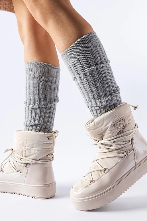 Beige gepatineerde snowboots met... Beige gepatineerde snowboots met...