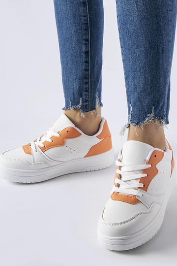 Hvide sko med orange accent Fournie