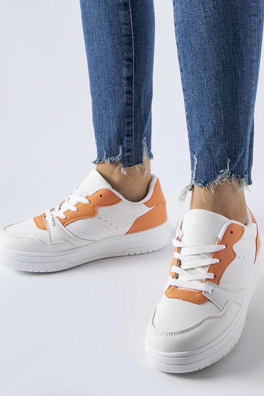 Hvide sko med orange accent Fournie