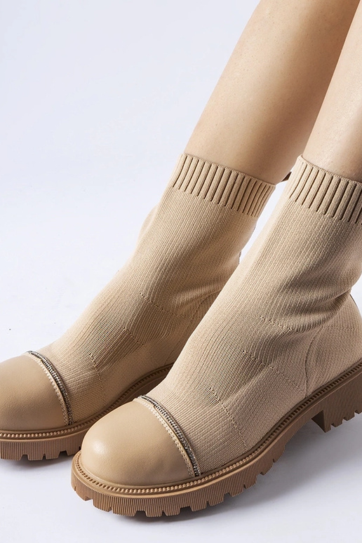 Bruine sok-achtige laarsjes met... Bruine sok-achtige laarsjes met...