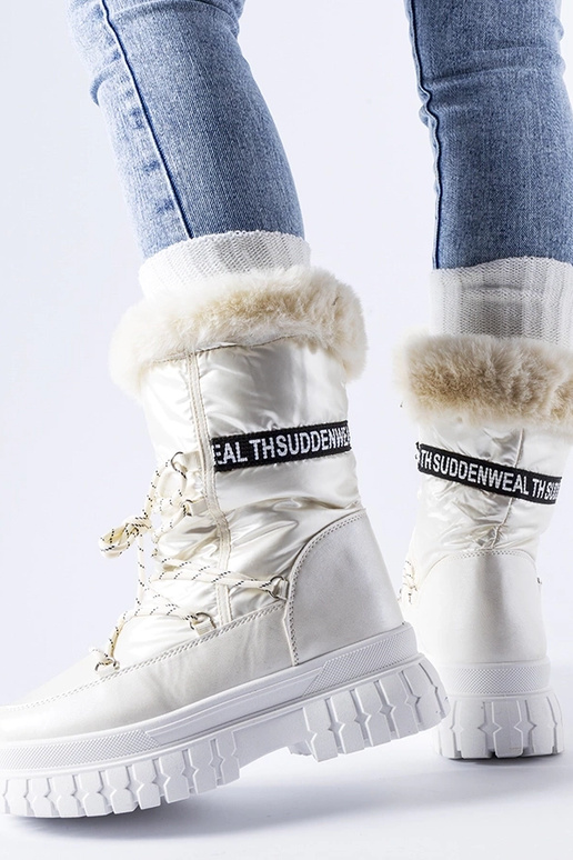 Beige verwarmde sneeuwlaarzen met de...