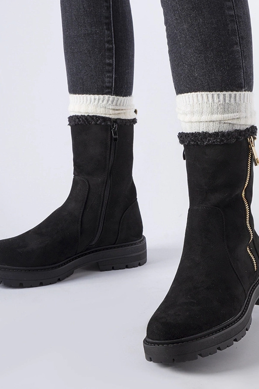 Zwarte verwarmde enkellaarsjes met... Zwarte verwarmde enkellaarsjes met...