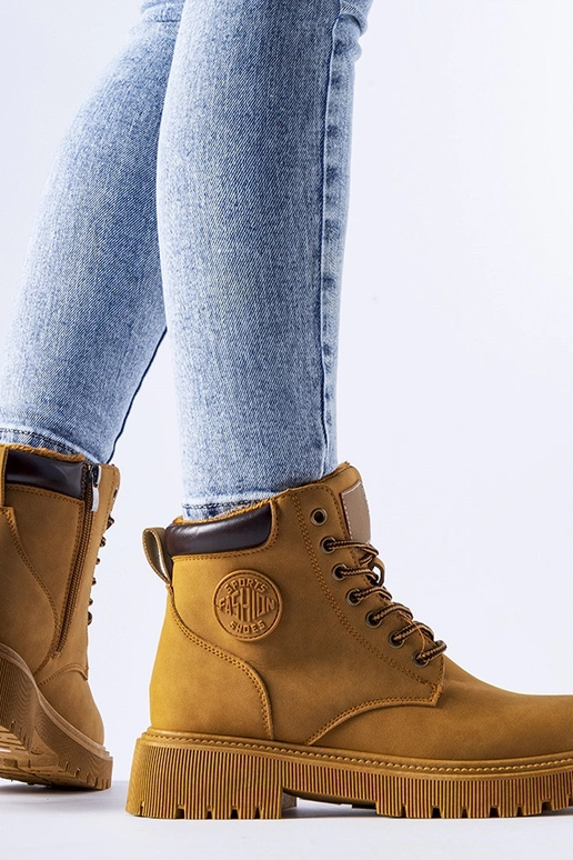 Klassieke bruine verwarmde boots Tricase Klassieke bruine verwarmde boots Tricase