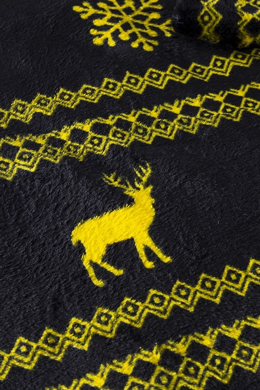 Velma sort tæppe med gule julemønstre