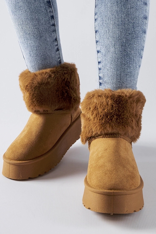 Bronskleurige sneeuwlaarzen versierd...