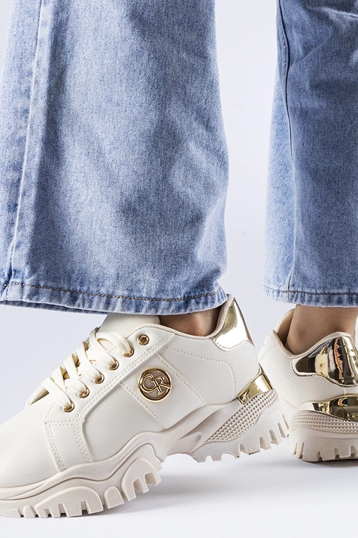 Beige sneakers med en massiv Arpaia-sål