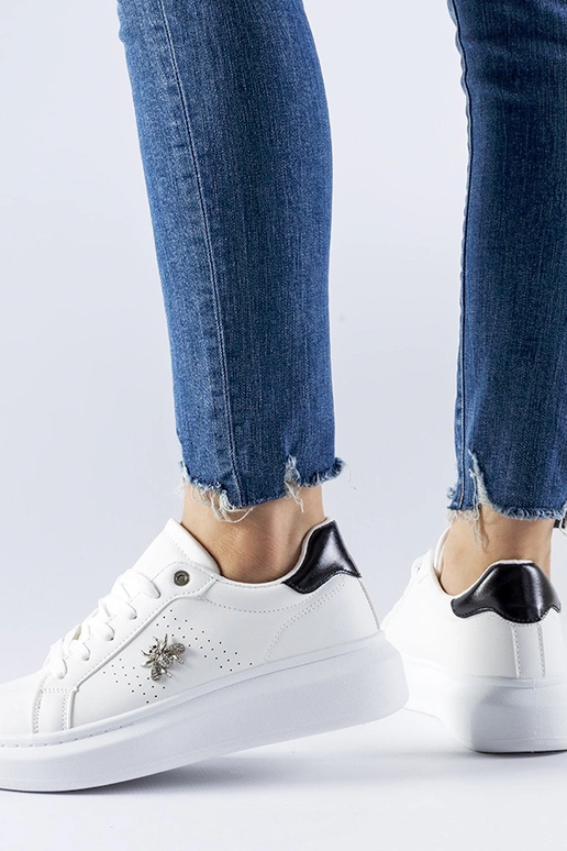 Witte sneakers met... Witte sneakers met...