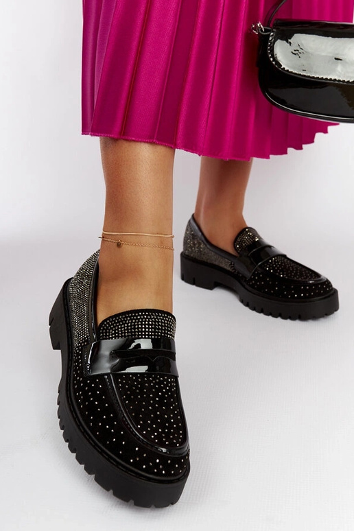 Sorte mokkasiner dekoreret med... Sorte mokkasiner dekoreret med...