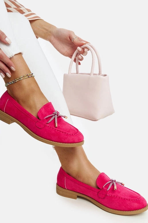 Donkerroze mocassins met decoratieve... Donkerroze mocassins met decoratieve...