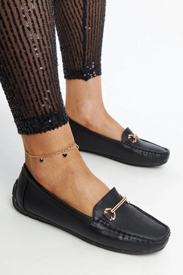 Sorte loafers med...