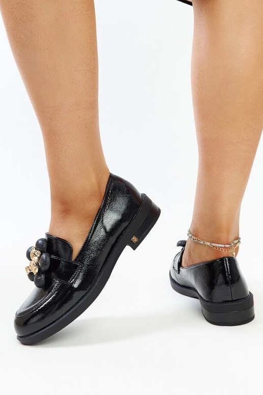 Zwarte lakleren mocassins met... Zwarte lakleren mocassins met...