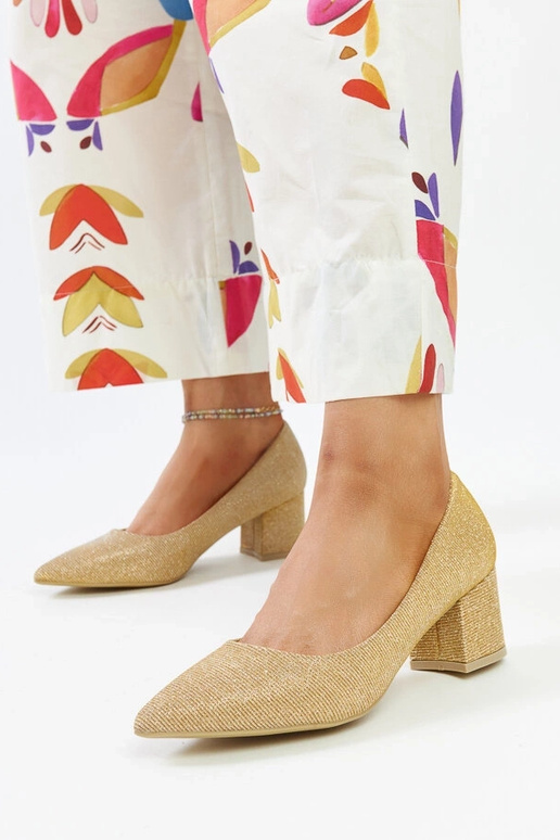 Gouden glanzende instappers met...