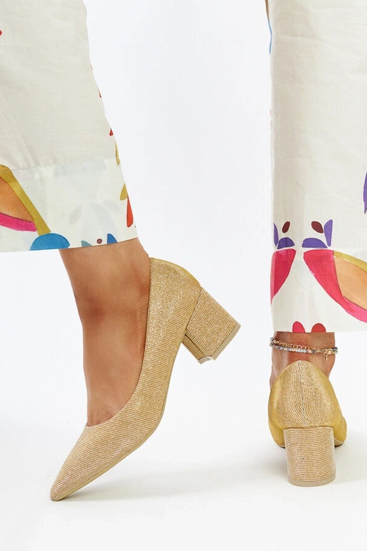 Gouden glanzende instappers met...