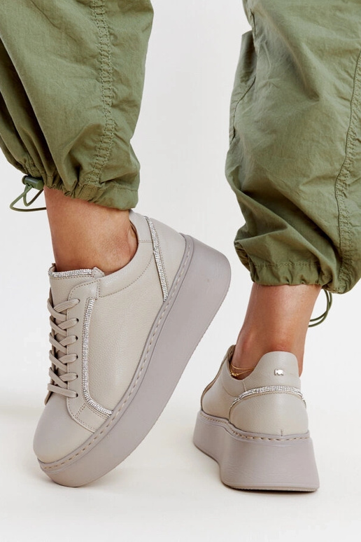 Donkerbeige leren sneakers met...
