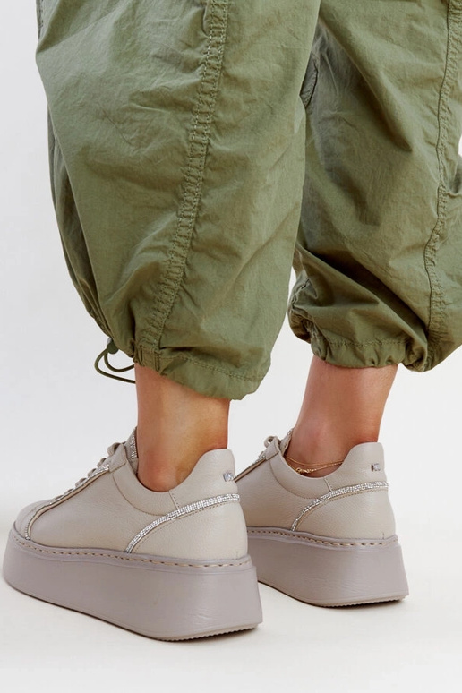 Donkerbeige leren sneakers met...