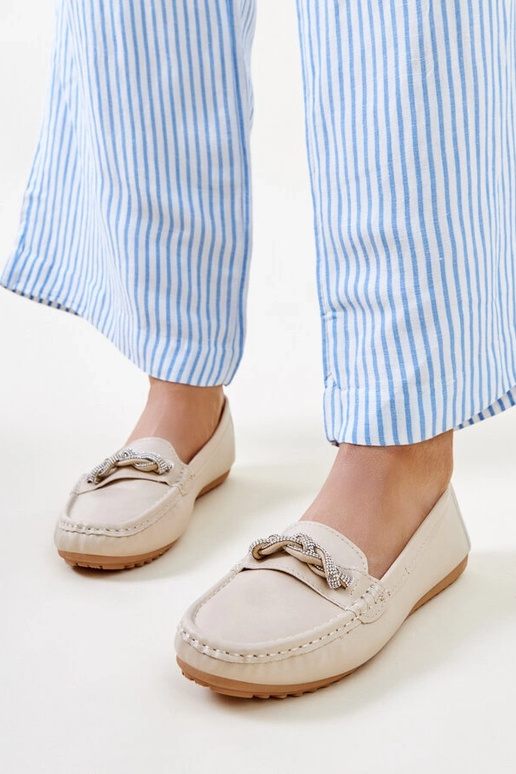 Beige mokkasiner dekoreret med... Beige mokkasiner dekoreret med...