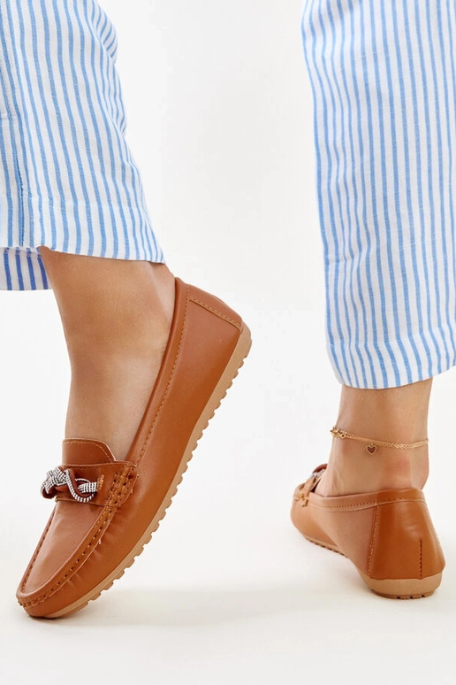 Brune mokkasiner dekoreret med... Brune mokkasiner dekoreret med...