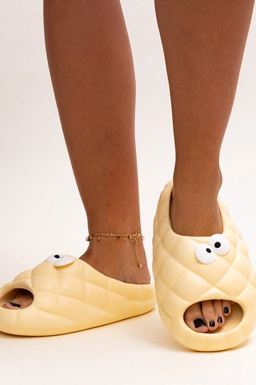 Beige skum flip-flops med Gorges øjne