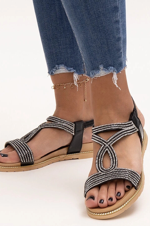 Sorte sandaler dekoreret med zirkoner...