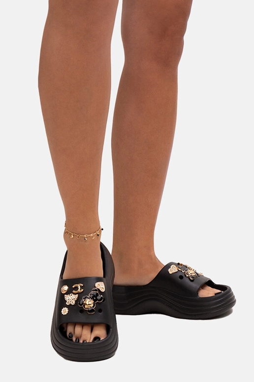 Sorte flip-flops med skinnende...