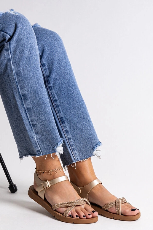 Guld sandaler dekoreret med zirkoner... Guld sandaler dekoreret med zirkoner...