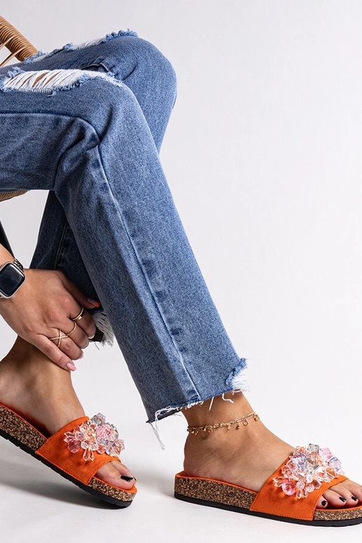 Orange flip-flops dekoreret med... Orange flip-flops dekoreret med...